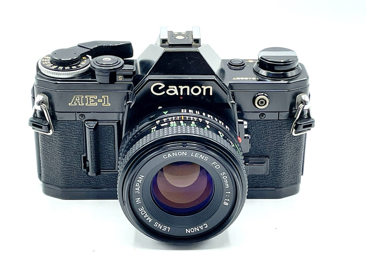 USED (8) - Canon ae-1 + 50mm f/1.8  program