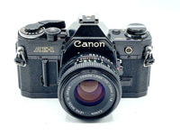 USED (8) - Canon ae-1 + 50mm f/1.8  program